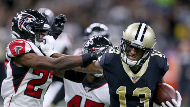 Michael Thomas stiff arms defender